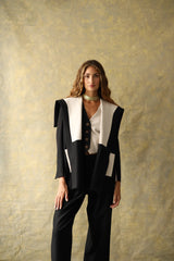 Veste en laine noire et blanche