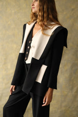 Veste en laine noire et blanche