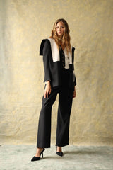 Veste en laine noire et blanche