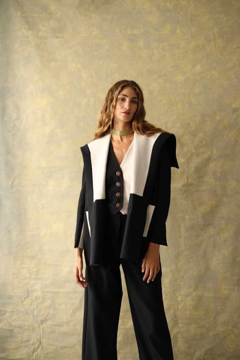 Veste en laine noire et blanche