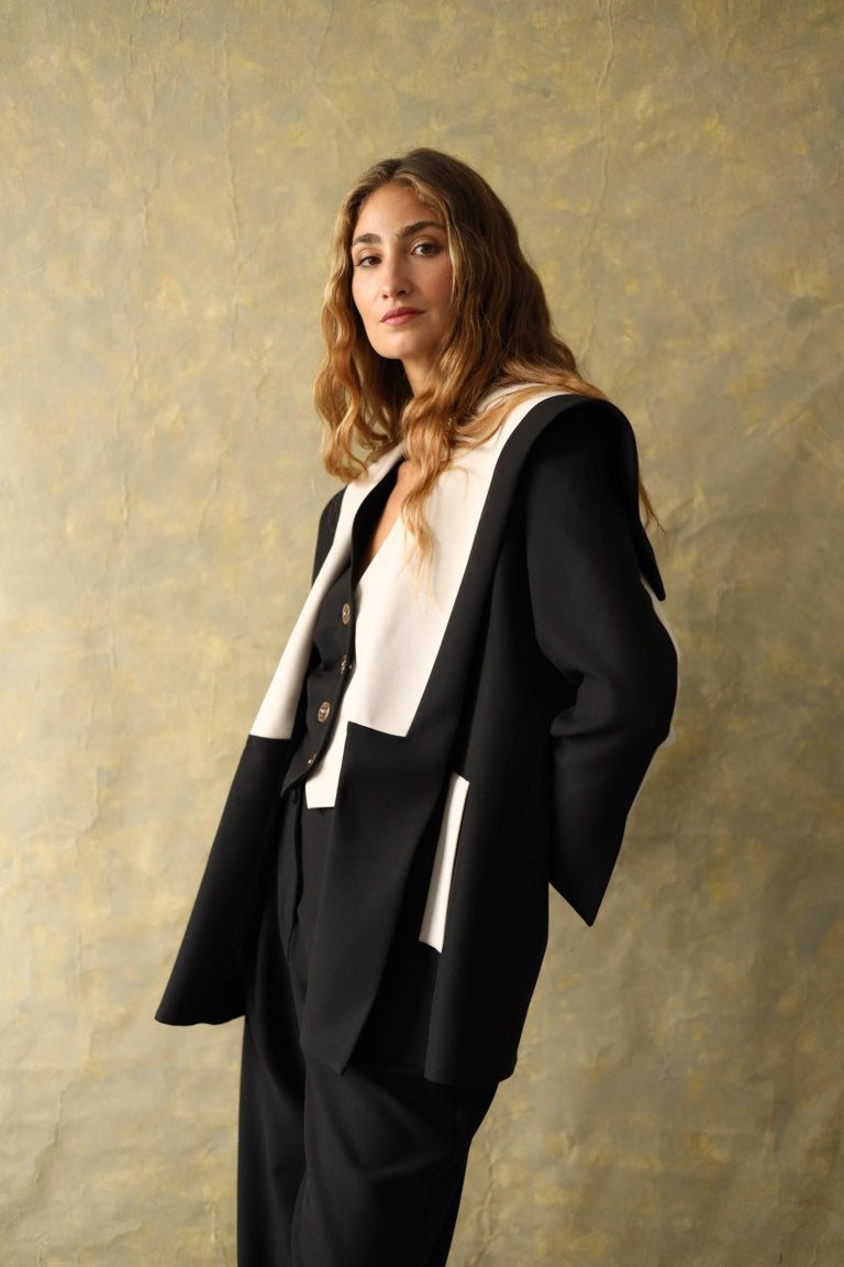 Veste en laine noire et blanche