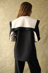 Veste en laine noire et blanche